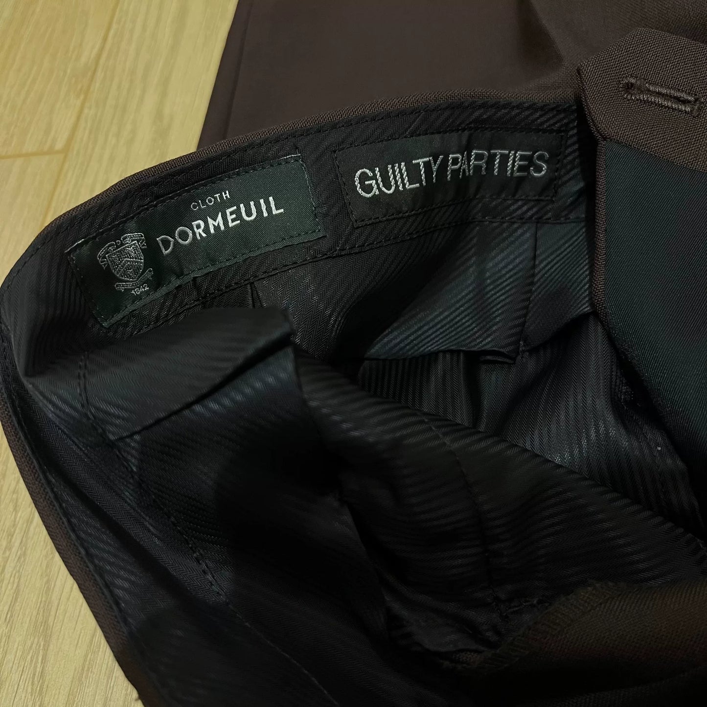 WACKOMARIA GUILTYPATIES Pleated Wool Trousers