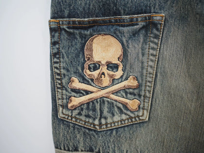 blue denim jeans with gold detail