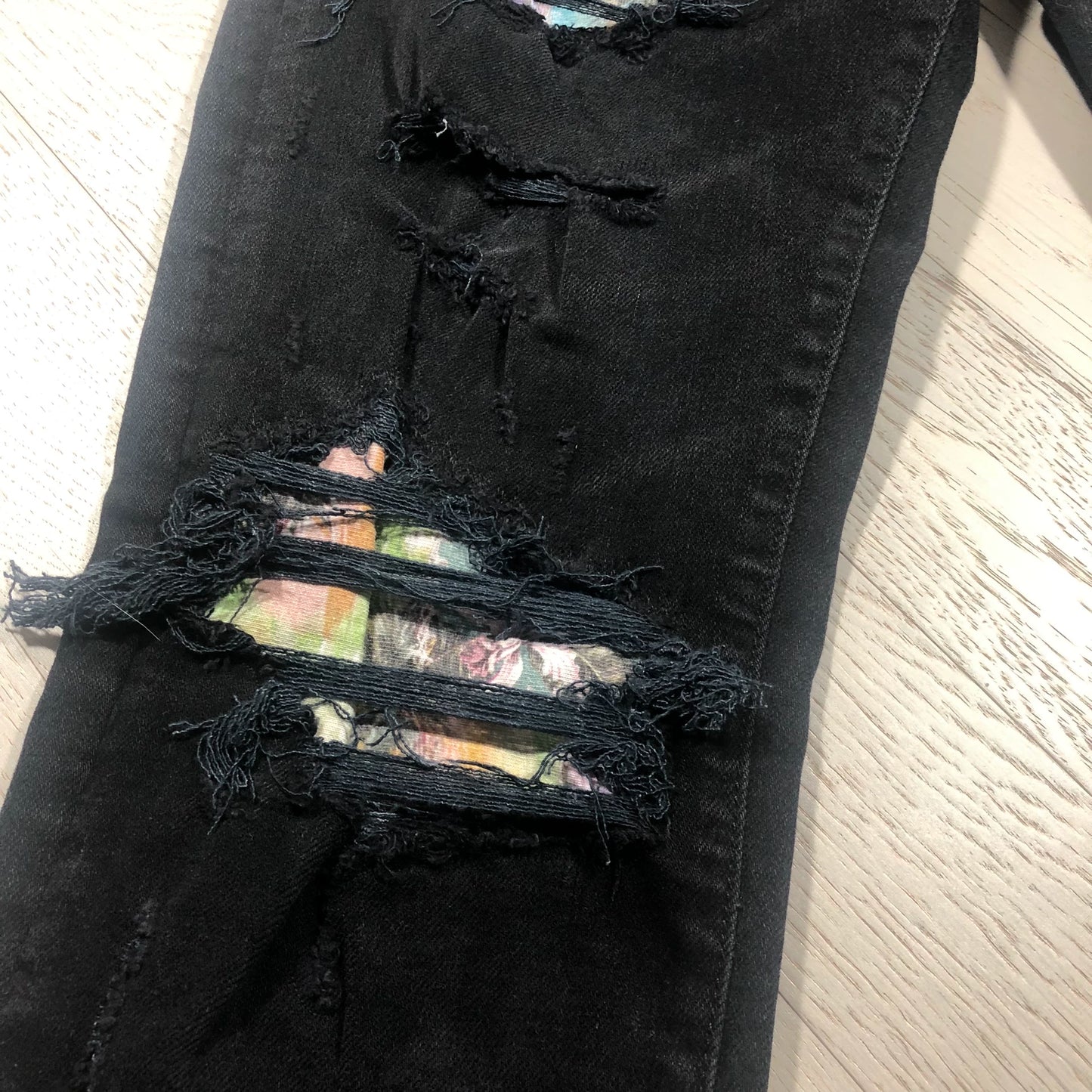 AMIRI Black Distressed Jeans with Floral Lining