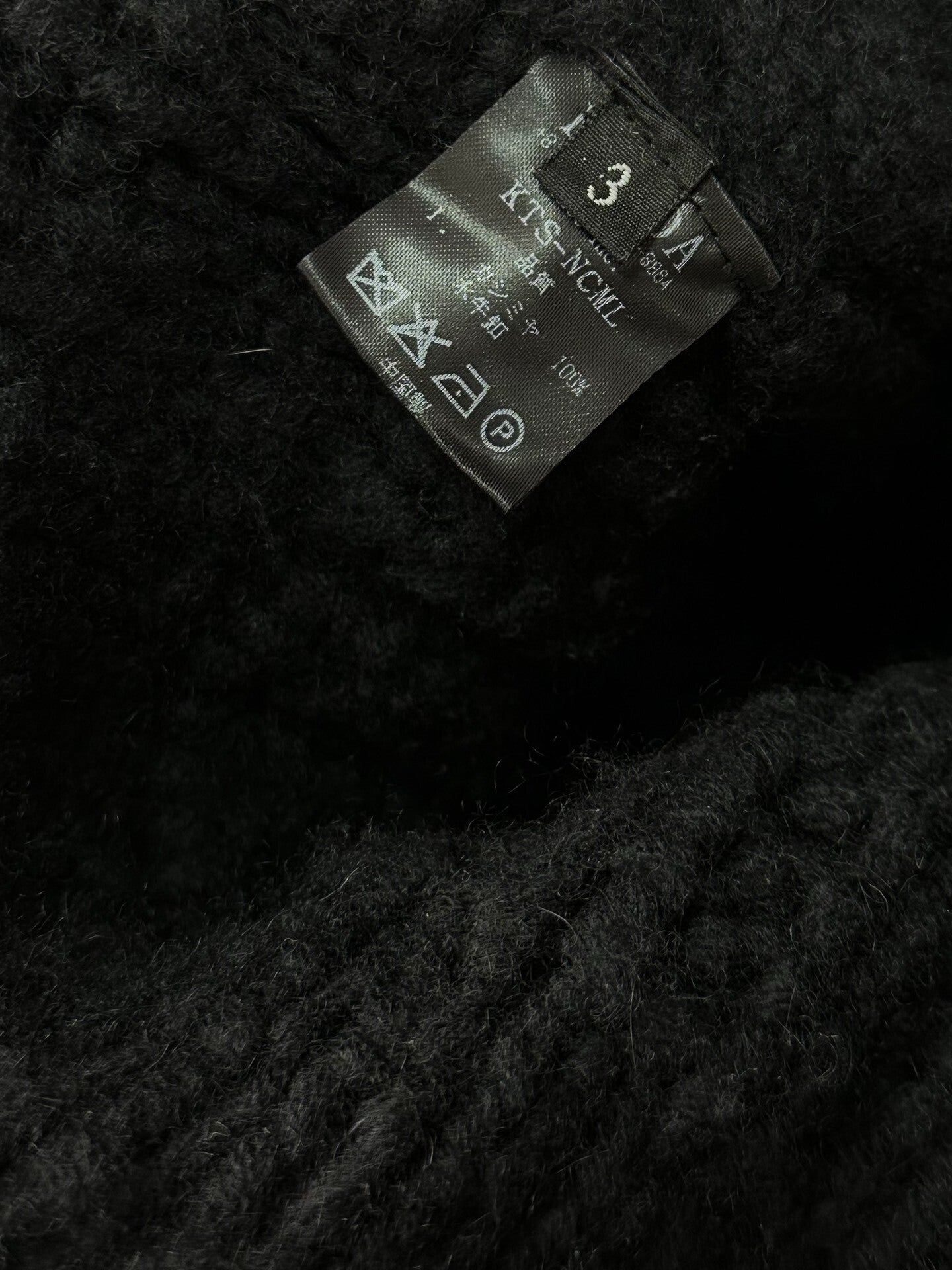 black oversized hand-knitted cashmere jacket