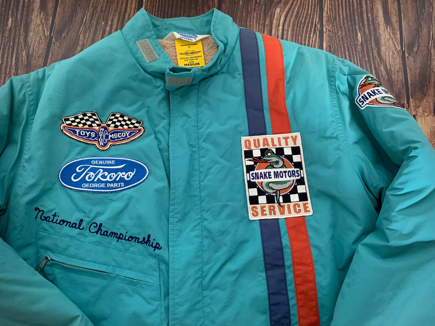 toys mccoy race track jacket in lake blue