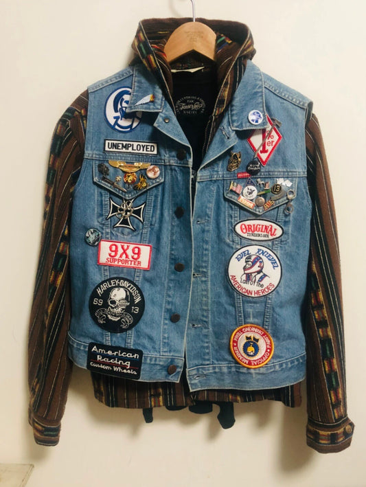 denim vest with patches and designs