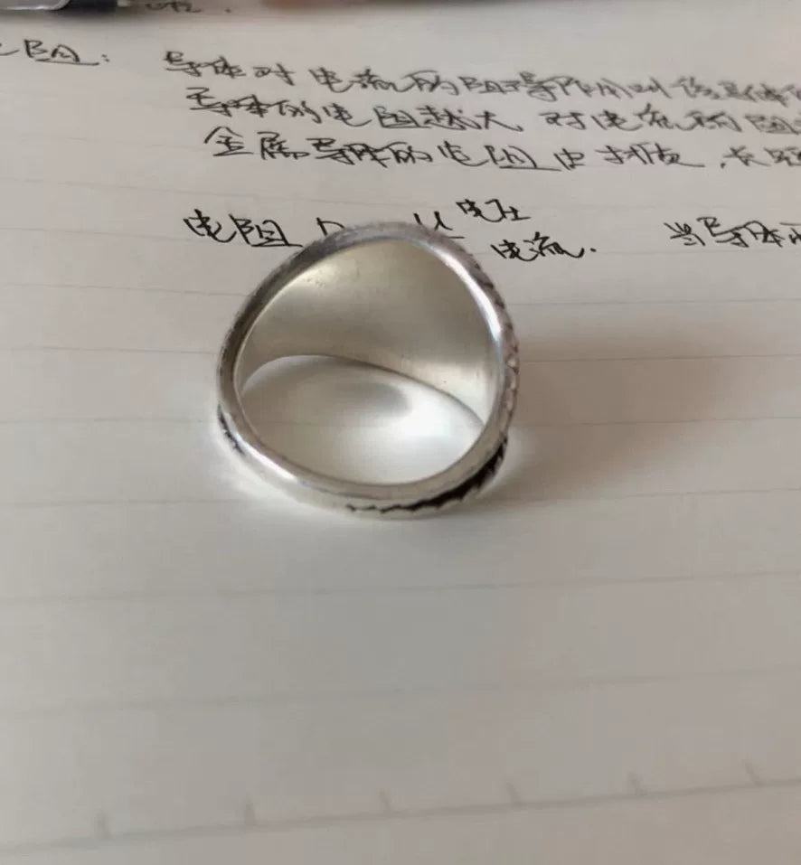 goros eagle ring with silver and gold details