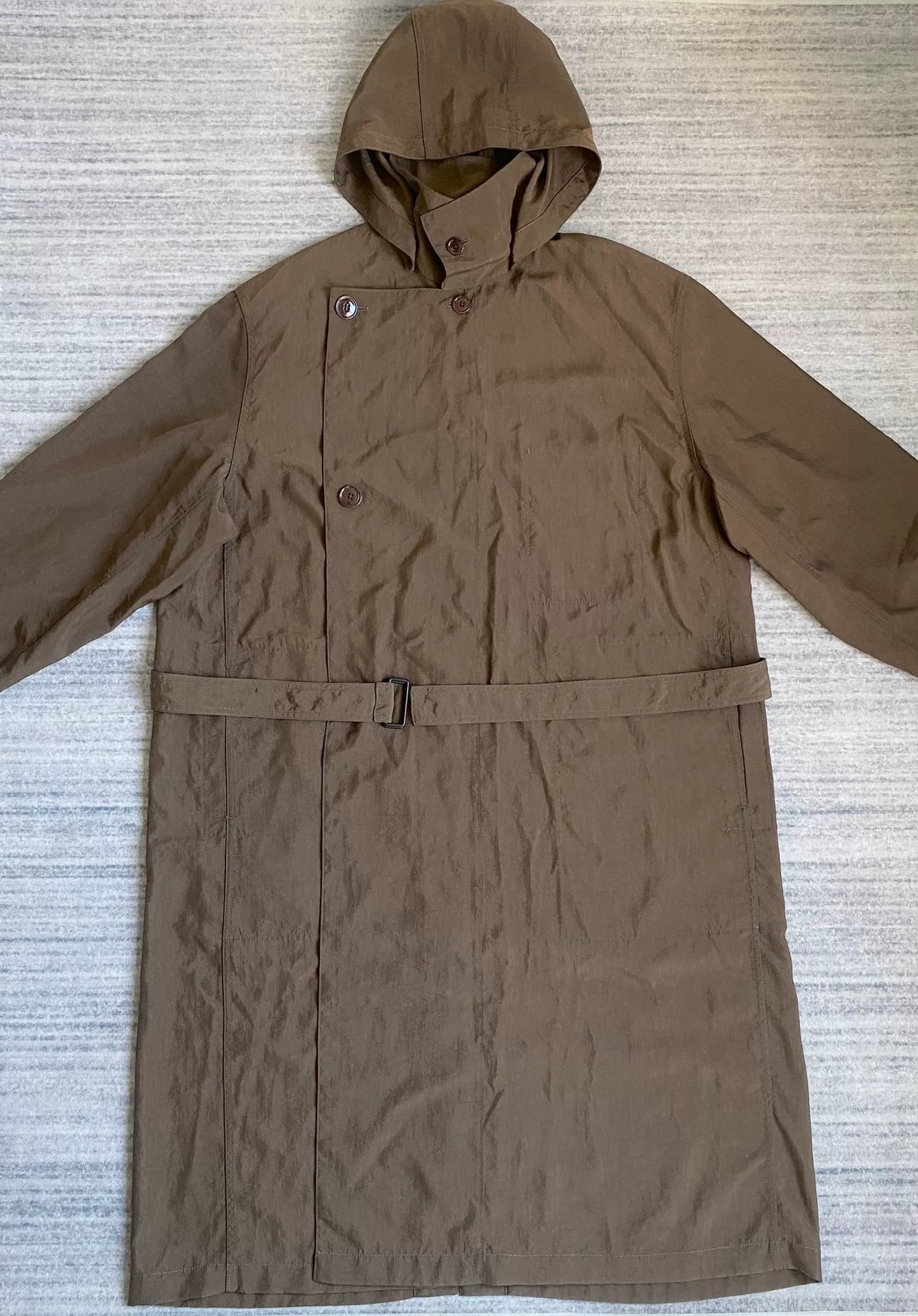 brown belted trench coat with military silhouette