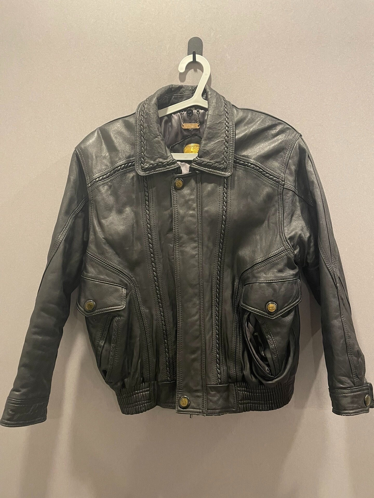 vintage woven leather jacket with detailed design
