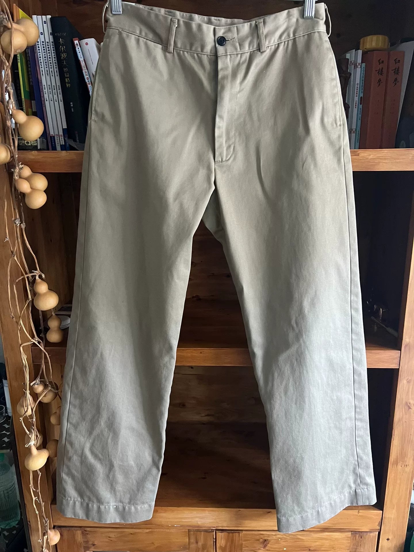 khaki pants with custom zipper details