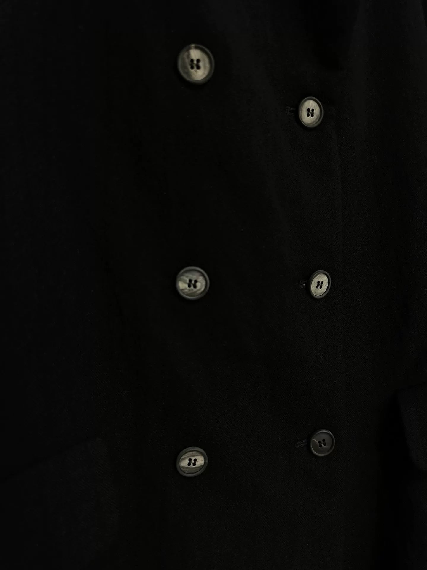 black double-breasted wool long coat