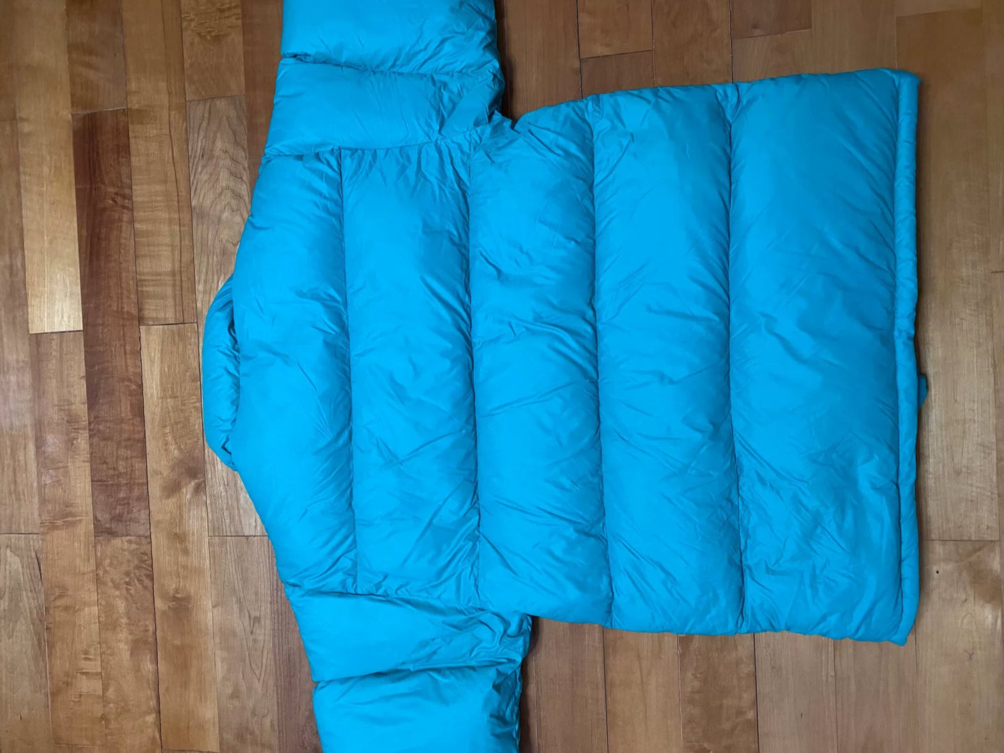 stylish teal puffer jacket for winter wear