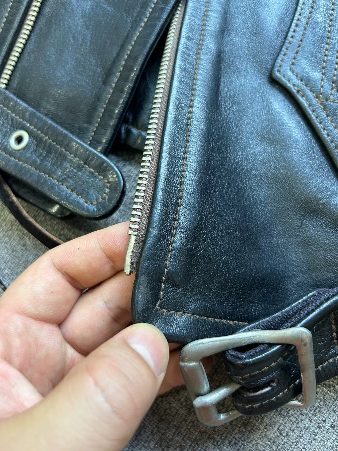 vintage black leather motorcycle jacket