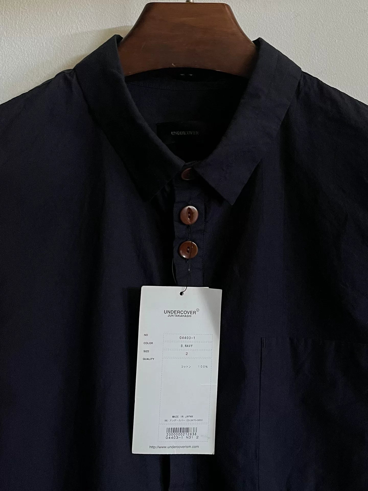 navy henley collar shirt from Undercover