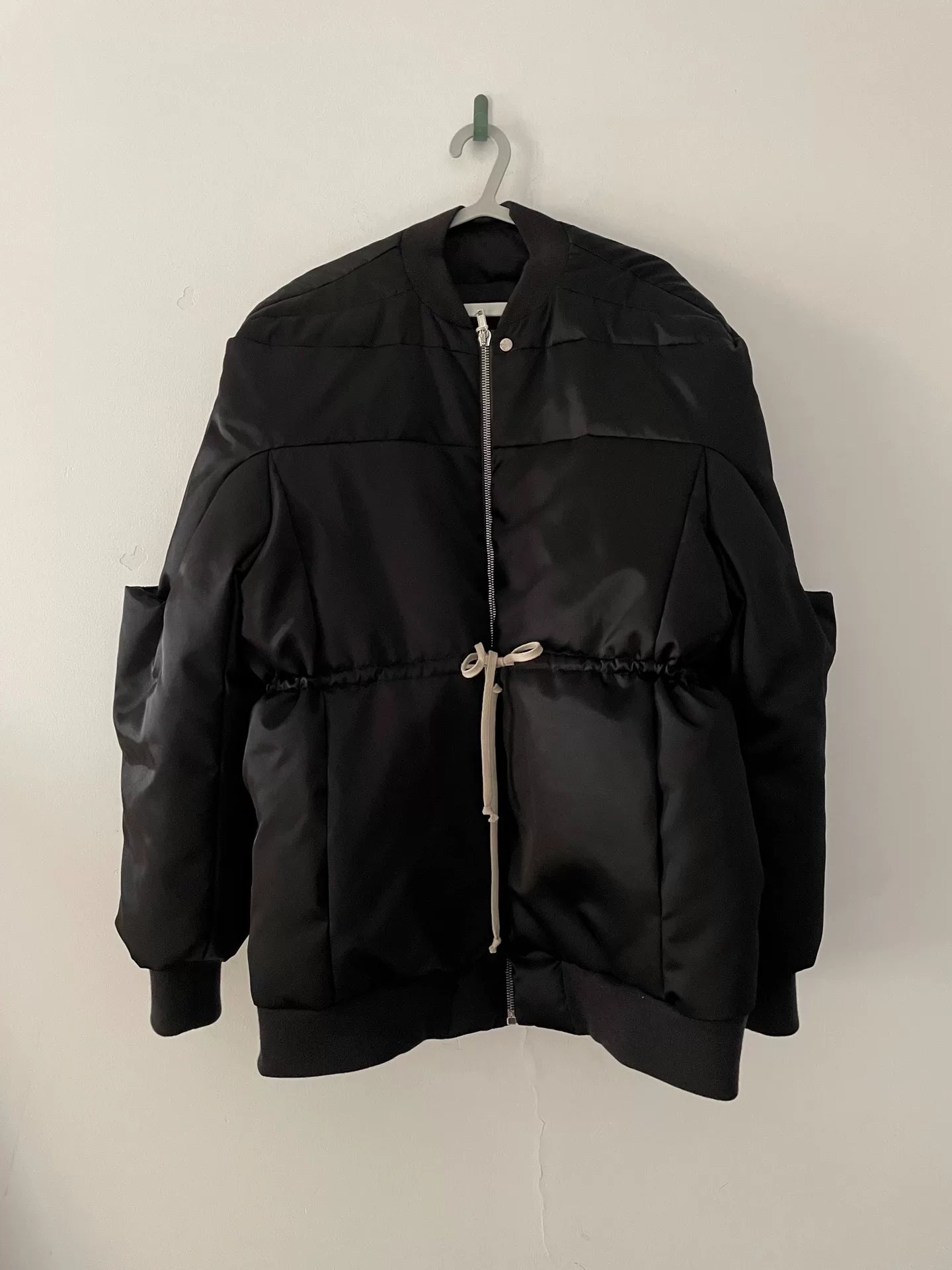 oversized black puffer jacket with waist tie