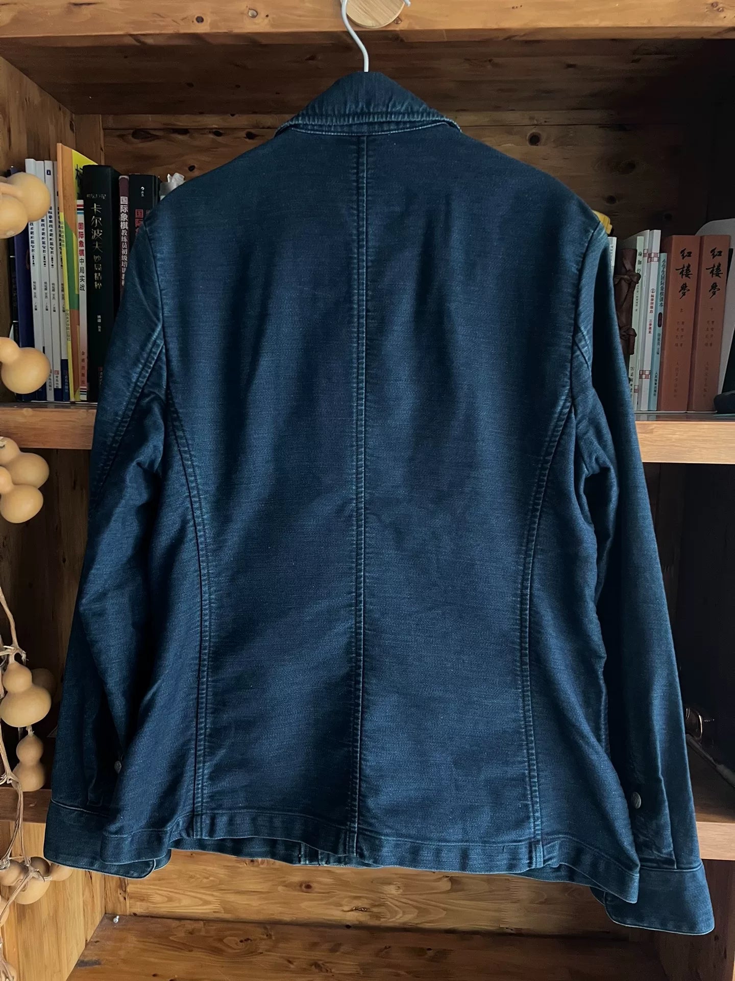 blue dyed motorcycle jacket with subtle vintage touch