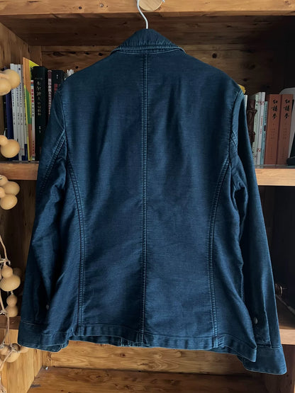 blue dyed motorcycle jacket with subtle vintage touch