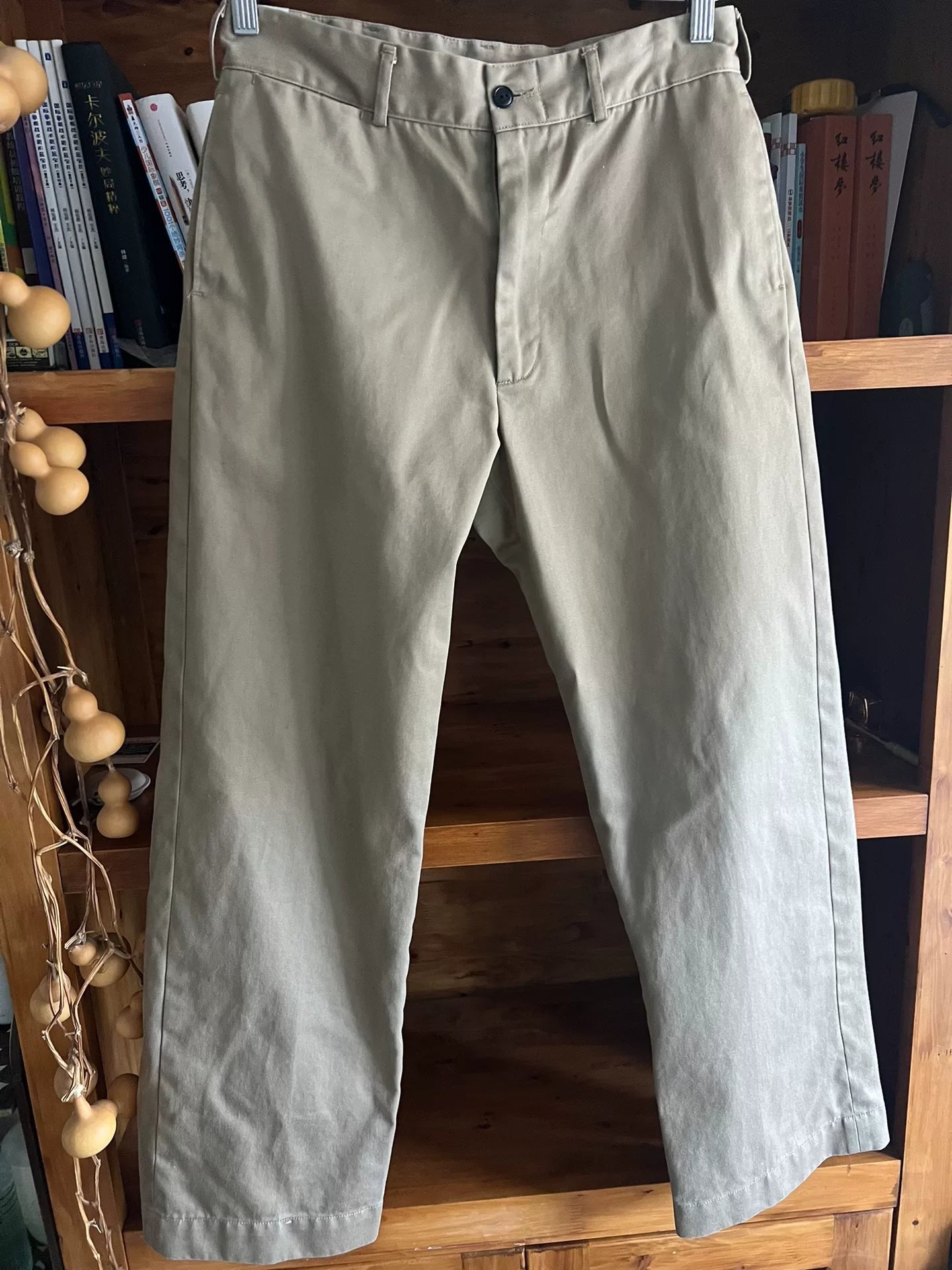 khaki pants with custom zipper details