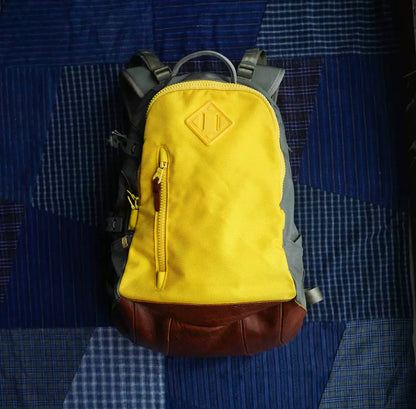 visvim ballistic 20l backpack in yellow