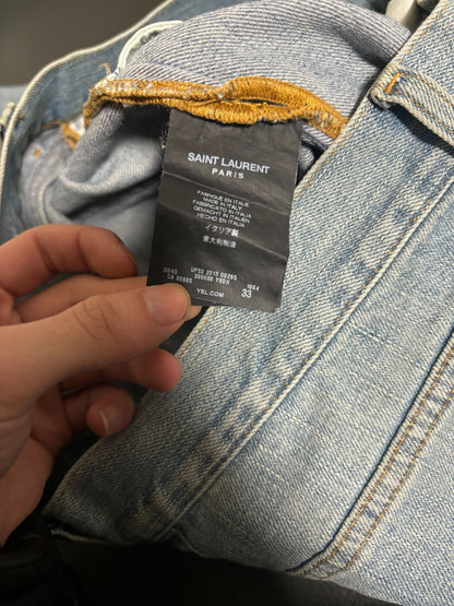 saint laurent ripped knee denim pants