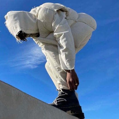 airei hand-stitched wool puffer vest