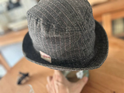 unique gray bucket hat with logo patch