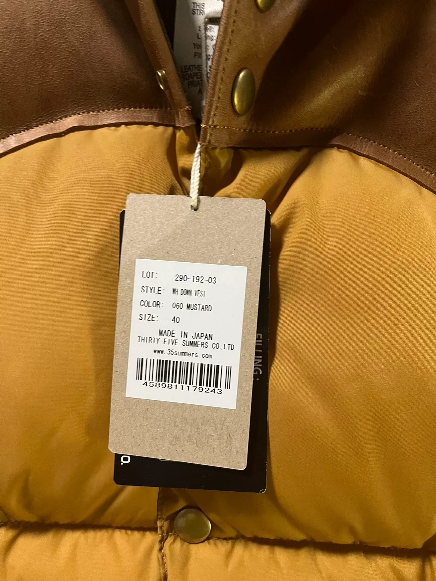 rocky mountain puffer vest size 40