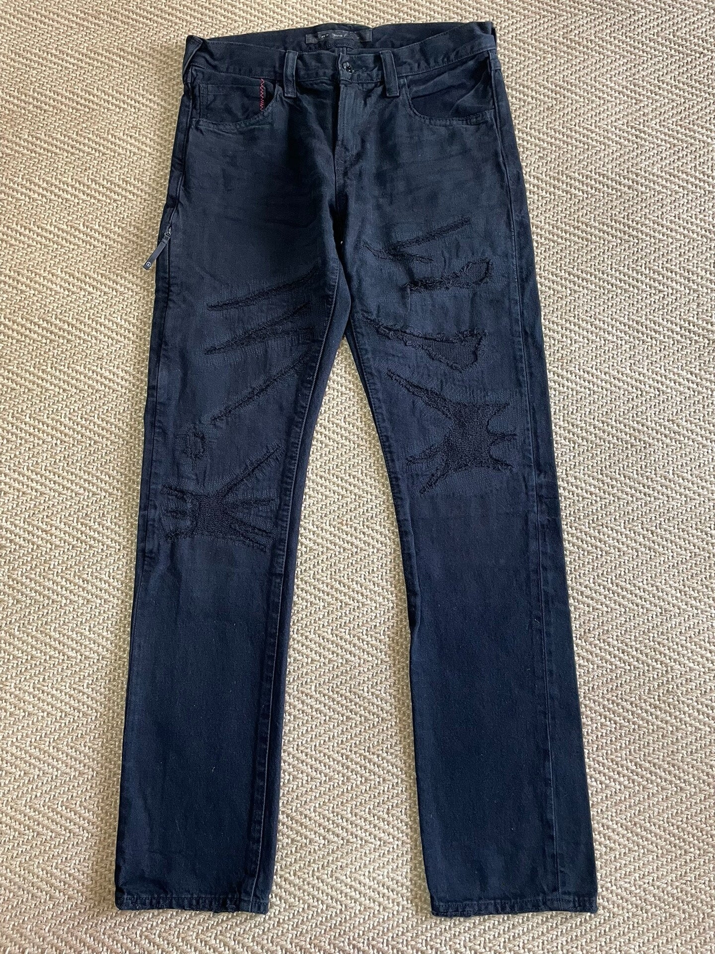 denim by vanquish & fragment distressed jeans