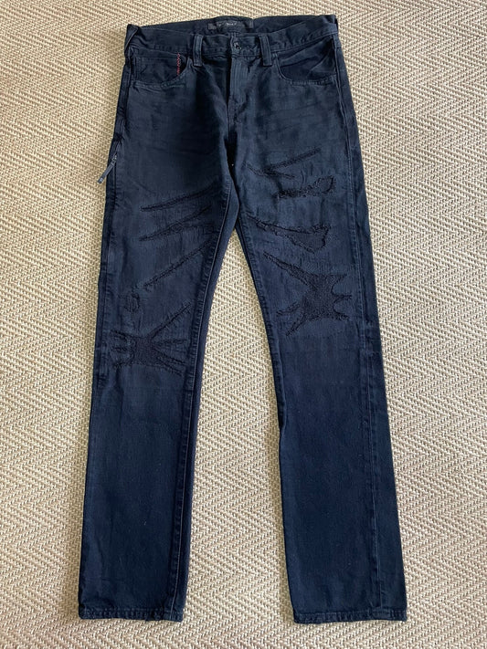 denim by vanquish & fragment distressed jeans