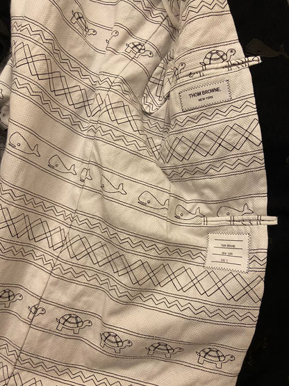thom browne embroidered black coat with details