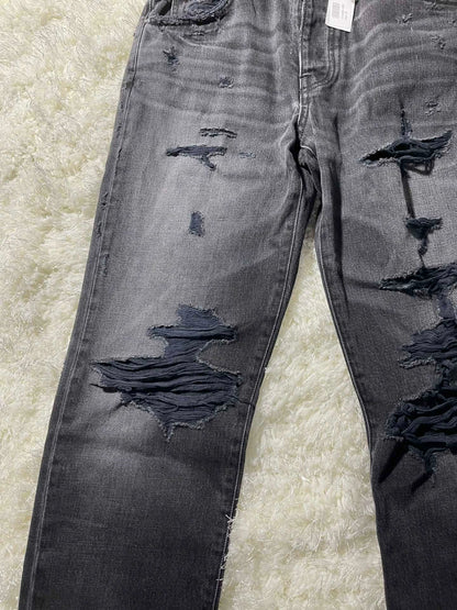 amiri destroyed slouch jeans in black