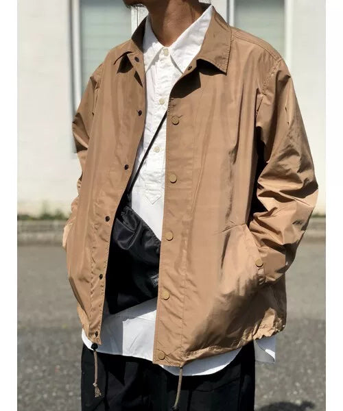 white mountaineering printed jacket