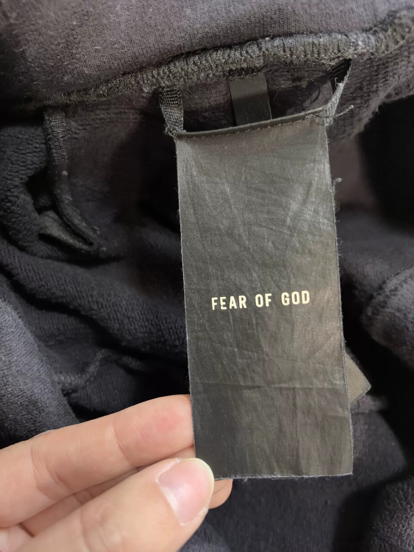 fear of god distressed shorts with belt