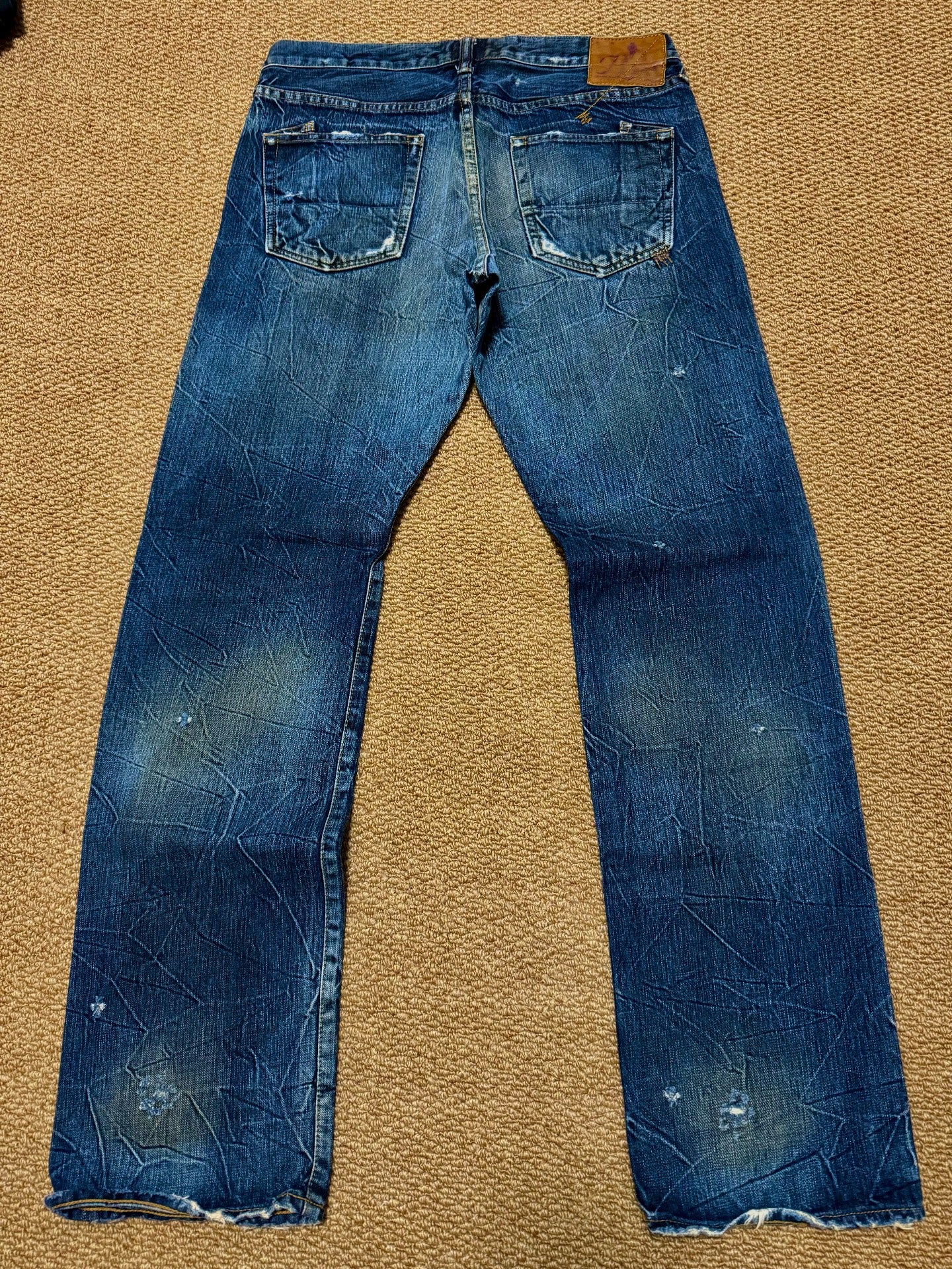 Blue Distressed Denim Jeans
