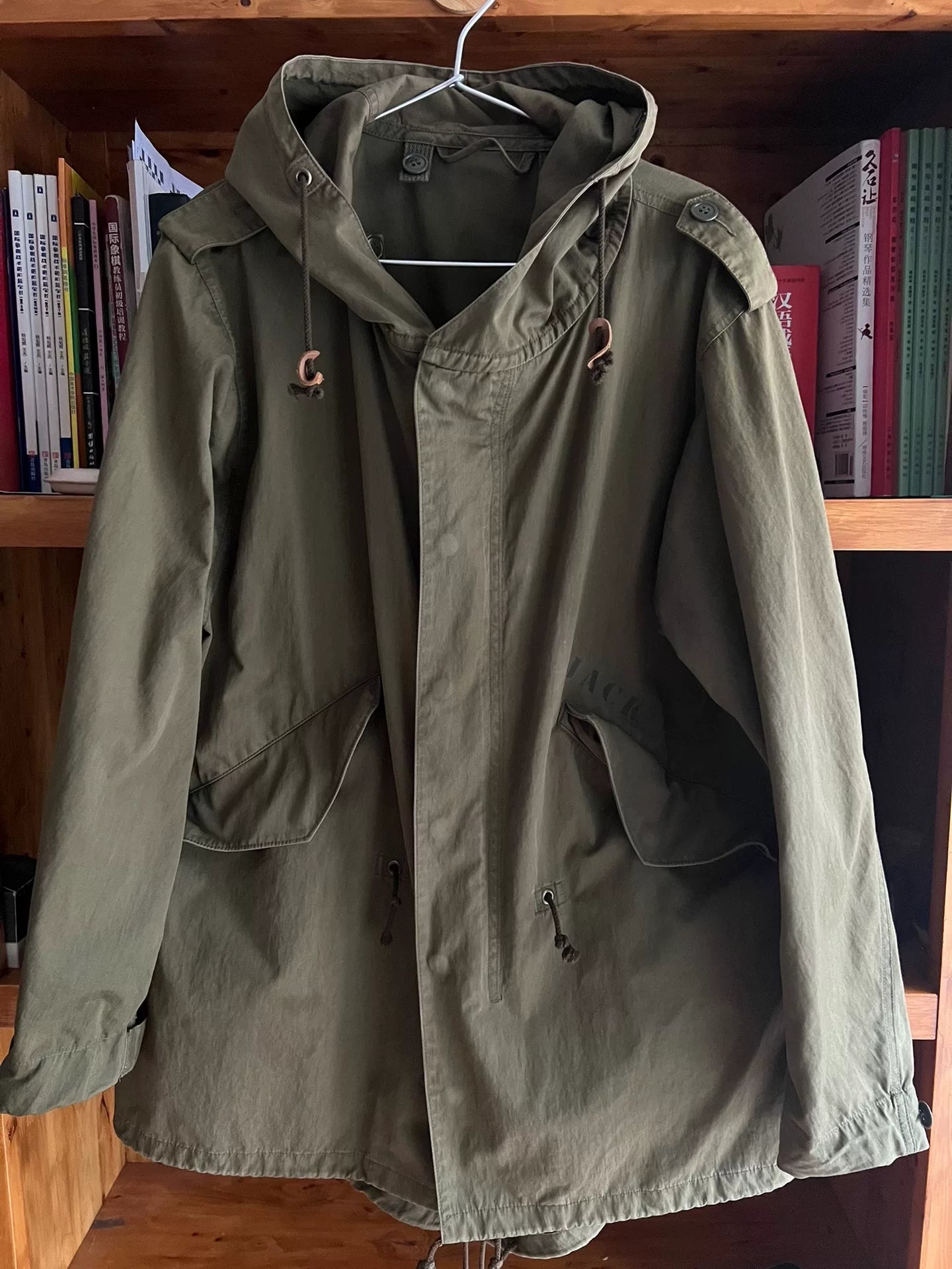 military-style hooded trench coat in olive green