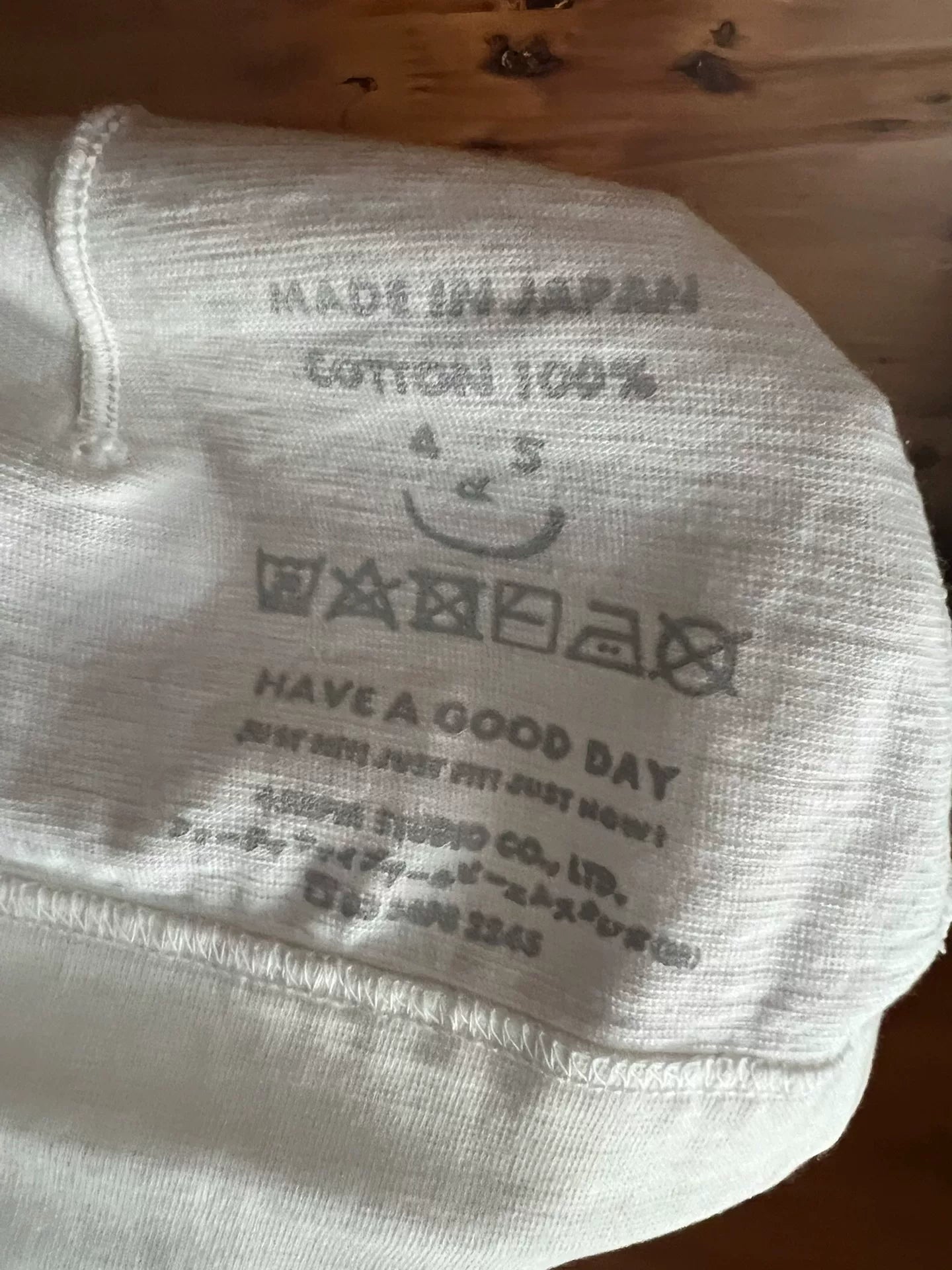 white knitted beanie with logo