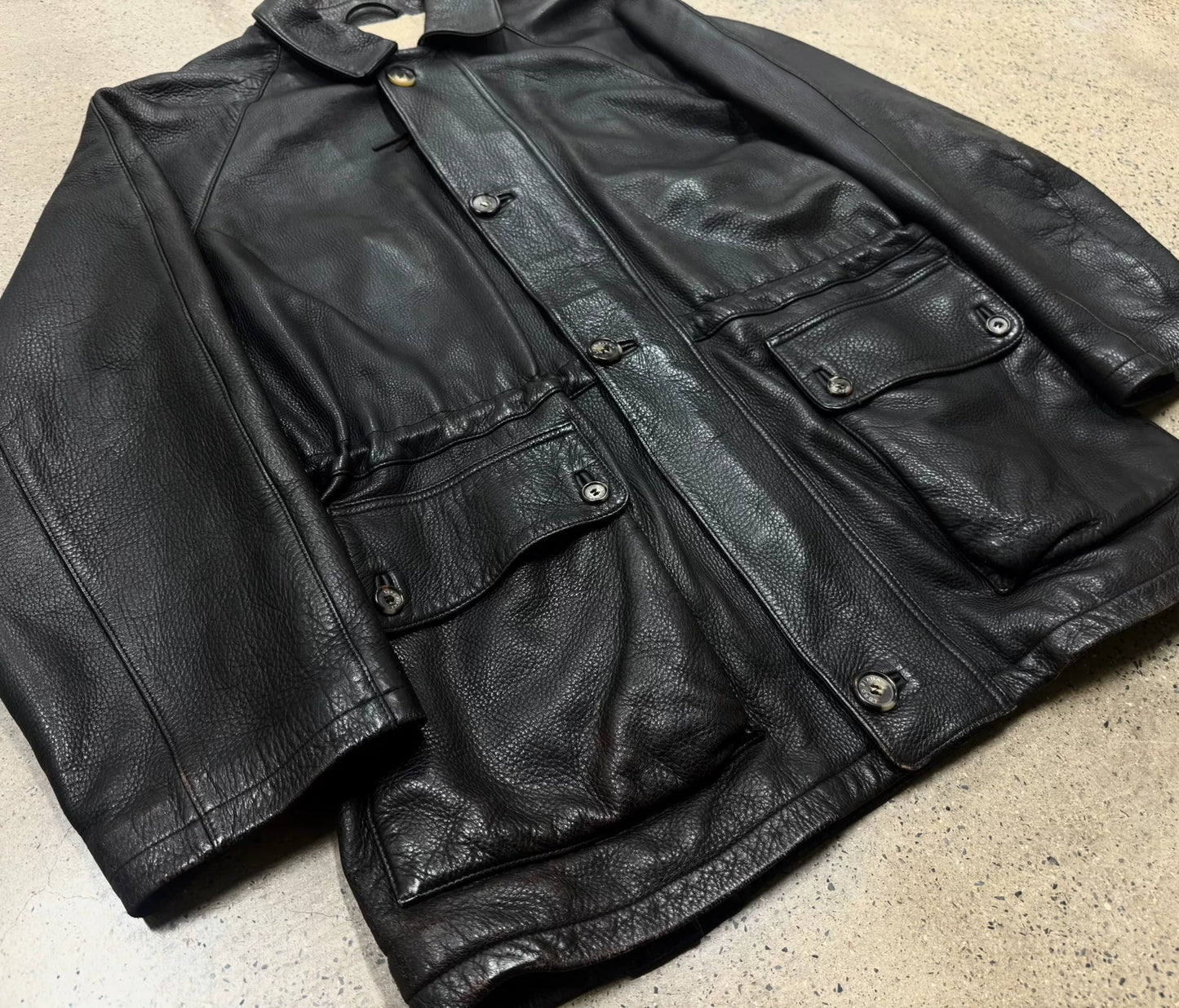 luxurious dark leather jacket with cashmere lining