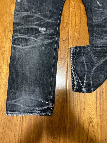 sequel fragment denim pants with distressing