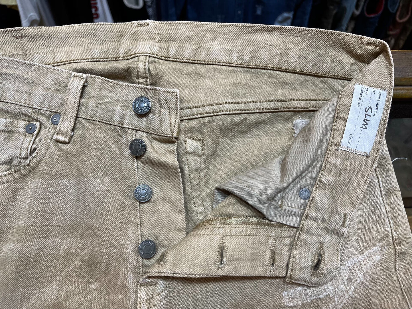 rrl distressed beige denim pants by Ralph Lauren