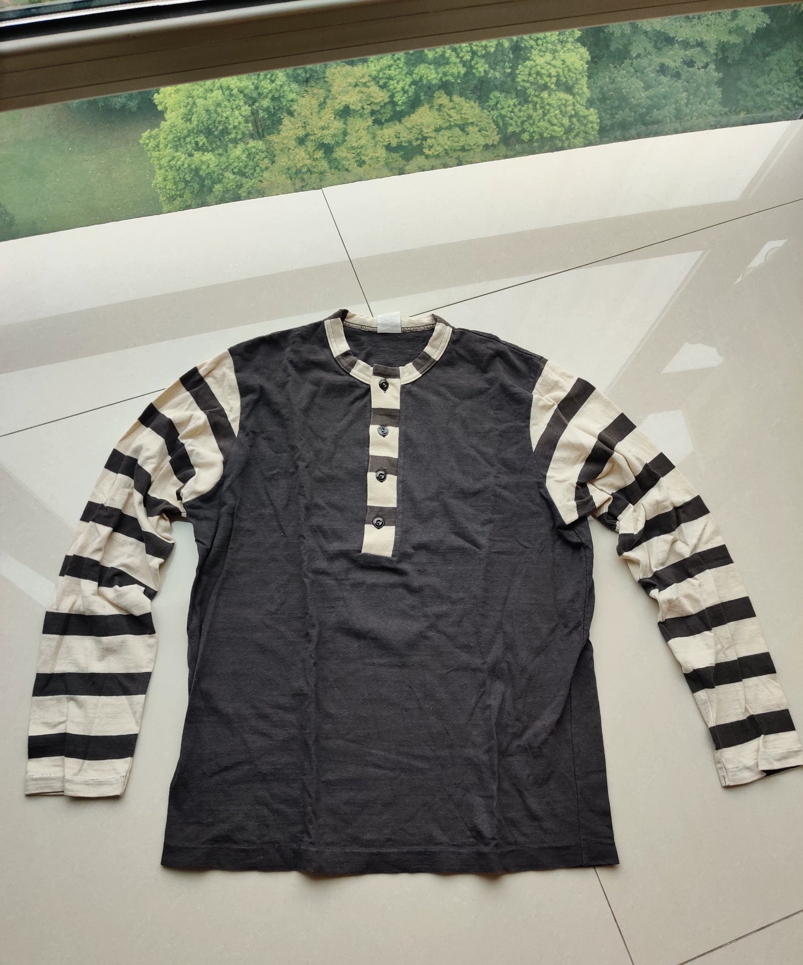 gray and white striped long sleeve shirt