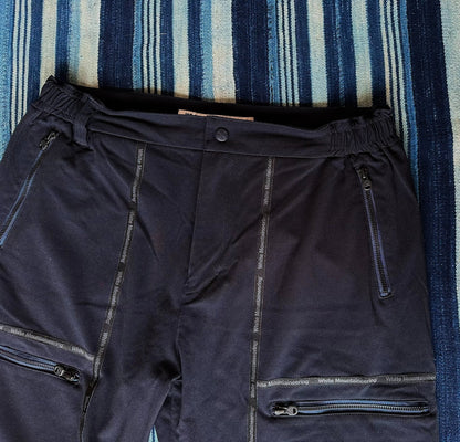 white mountaineering functional shorts with quick-dry fabric