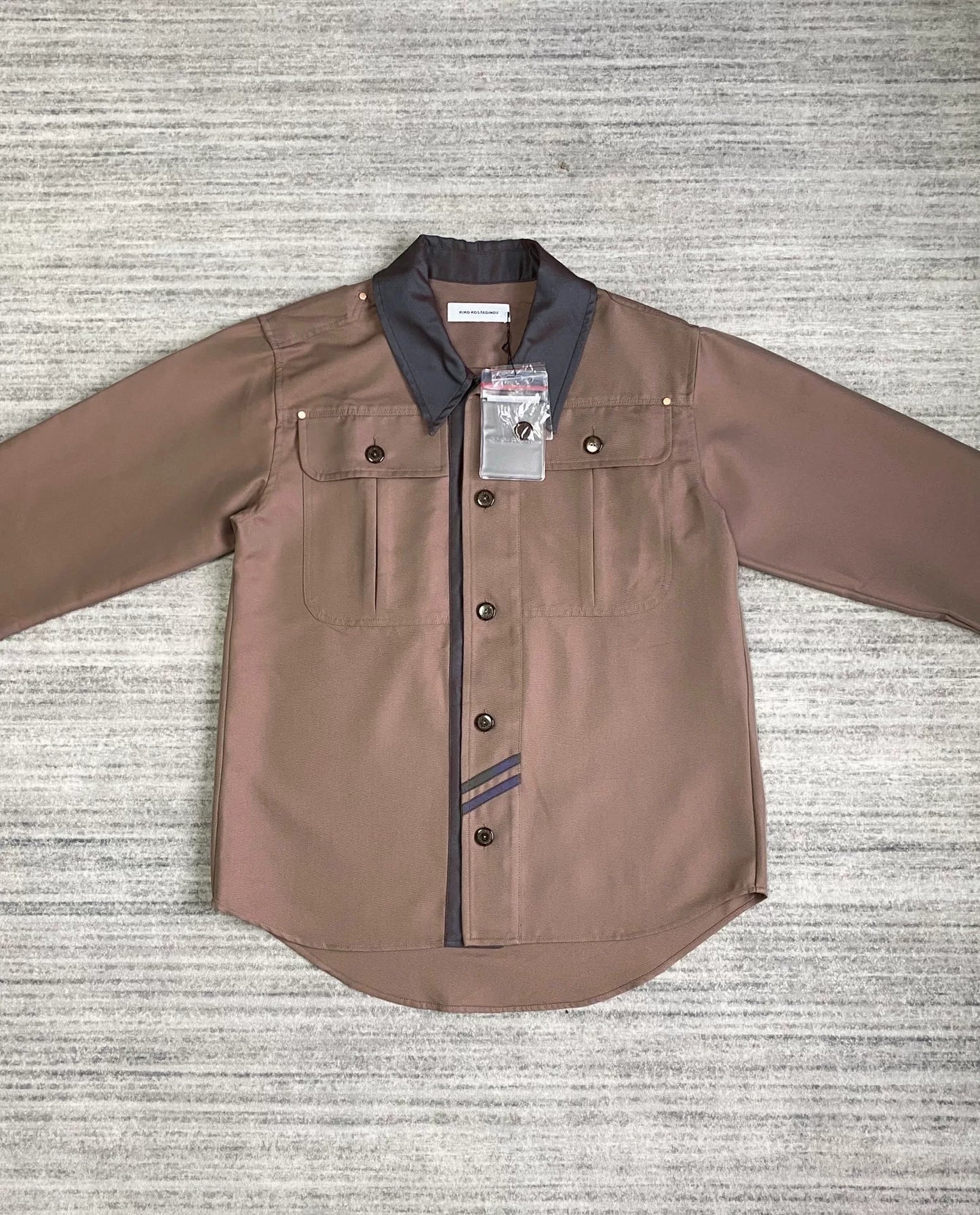 brown patchwork jacket by Kiko Kostadinov