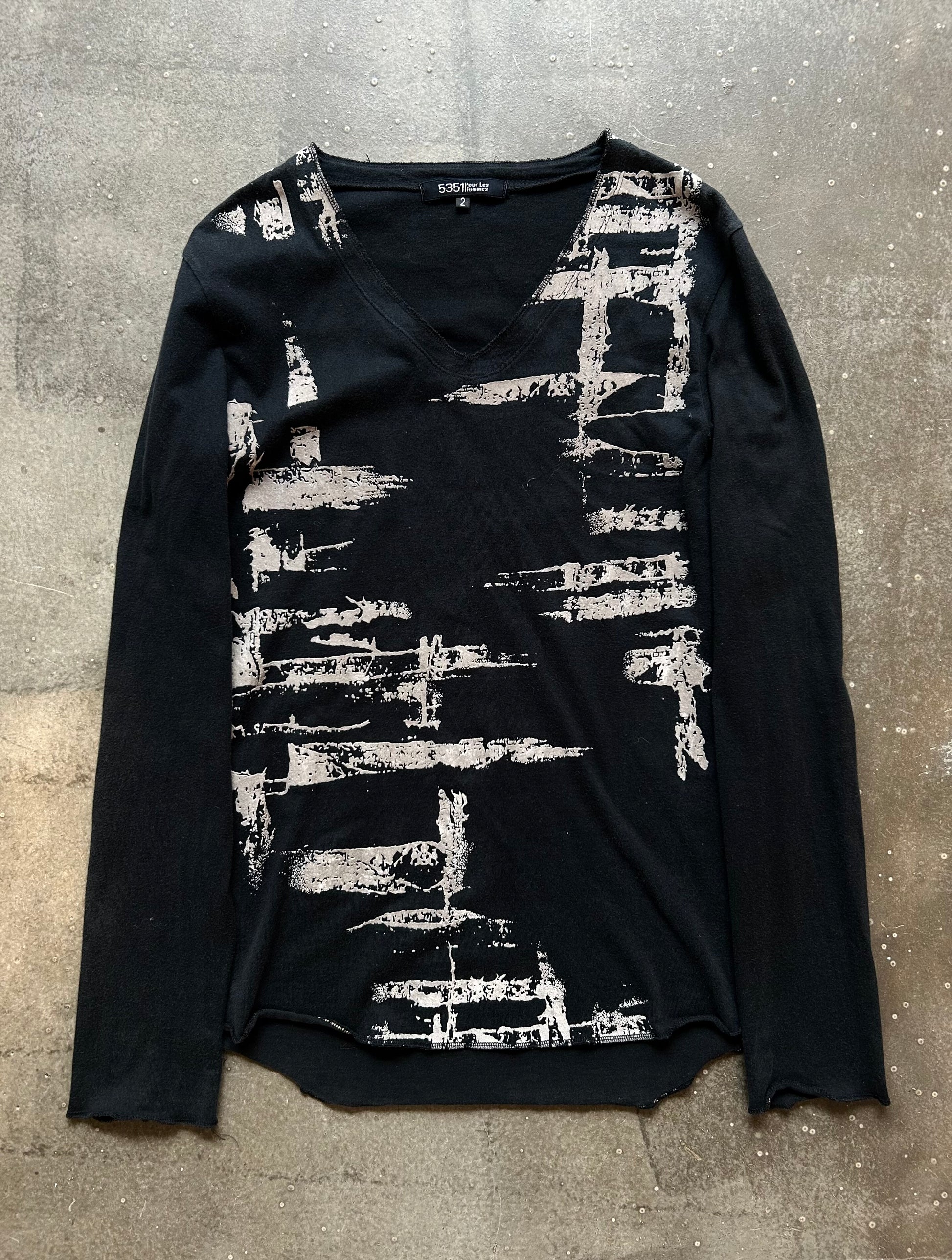 black long sleeve graphic top
