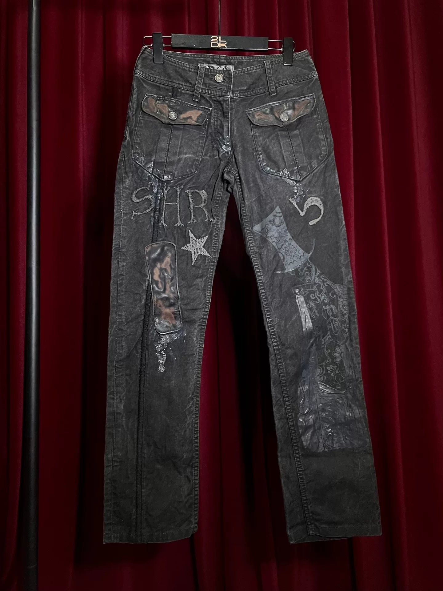 embroidered denim pants with patchwork details