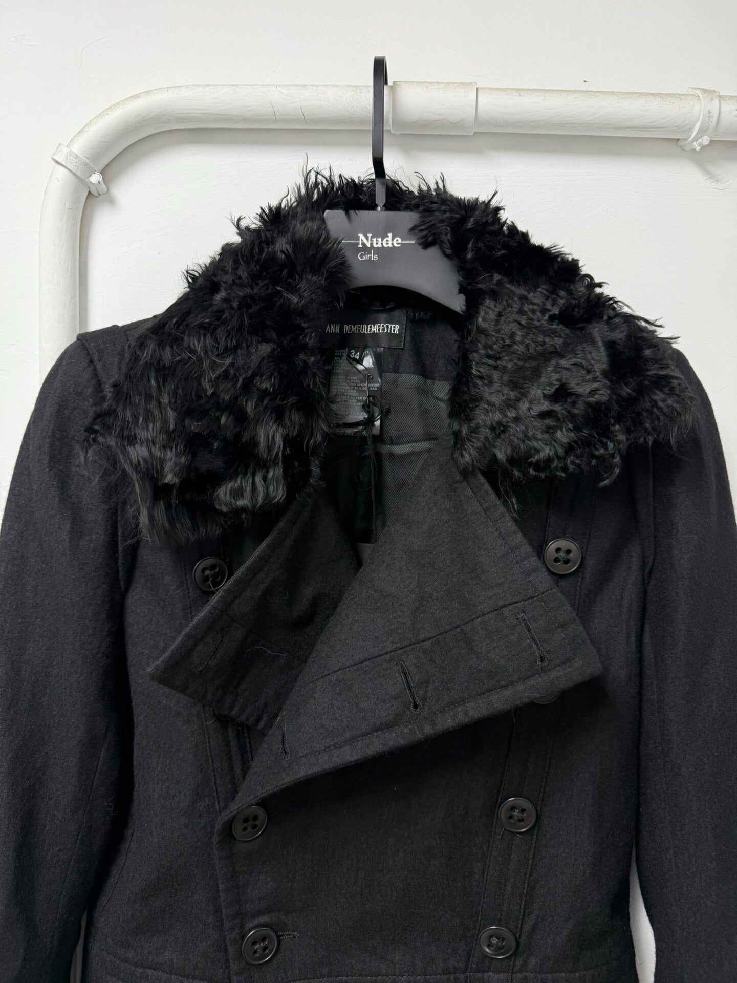 black double-breasted jacket with fur collar