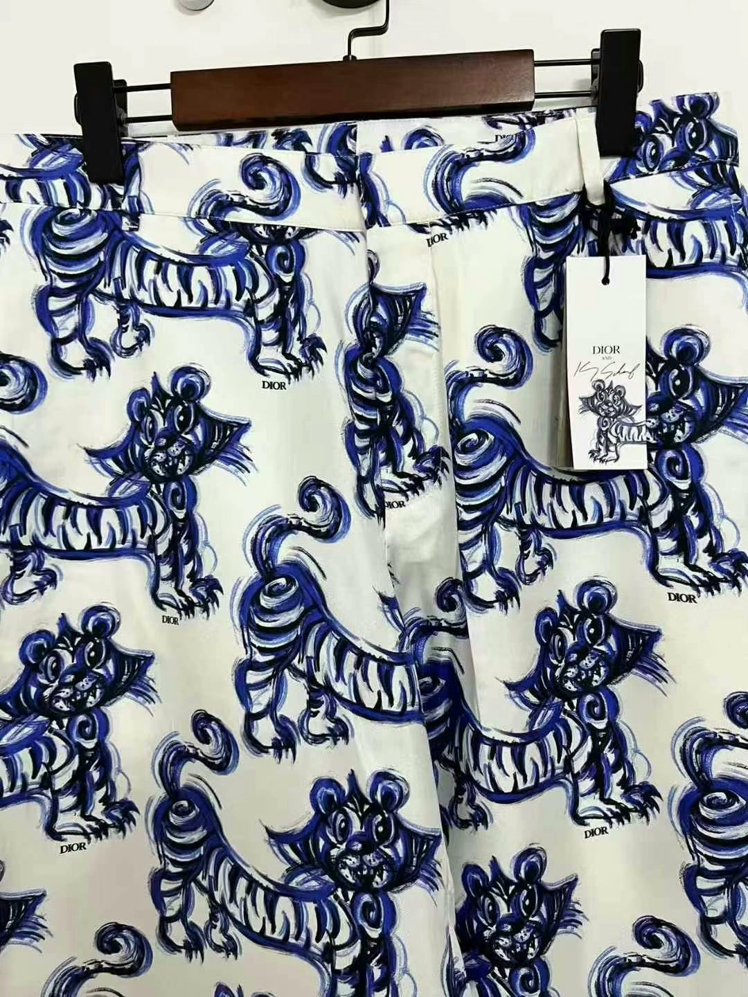 dior tiger logo shorts in white and blue