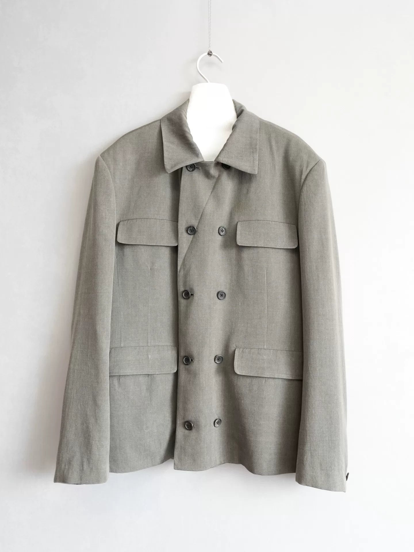 double-breasted concrete gray jacket