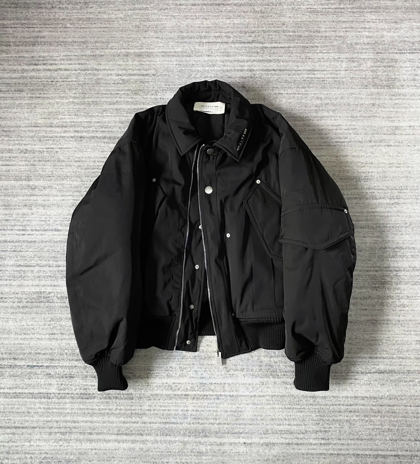 black bomber jacket with hidden pockets