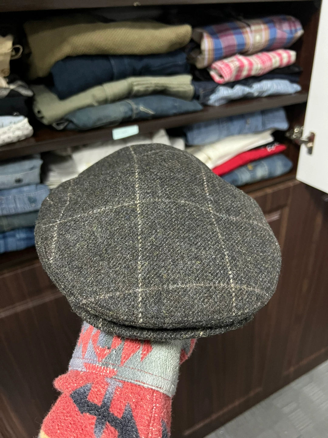 gray newsboy cap with plaid pattern