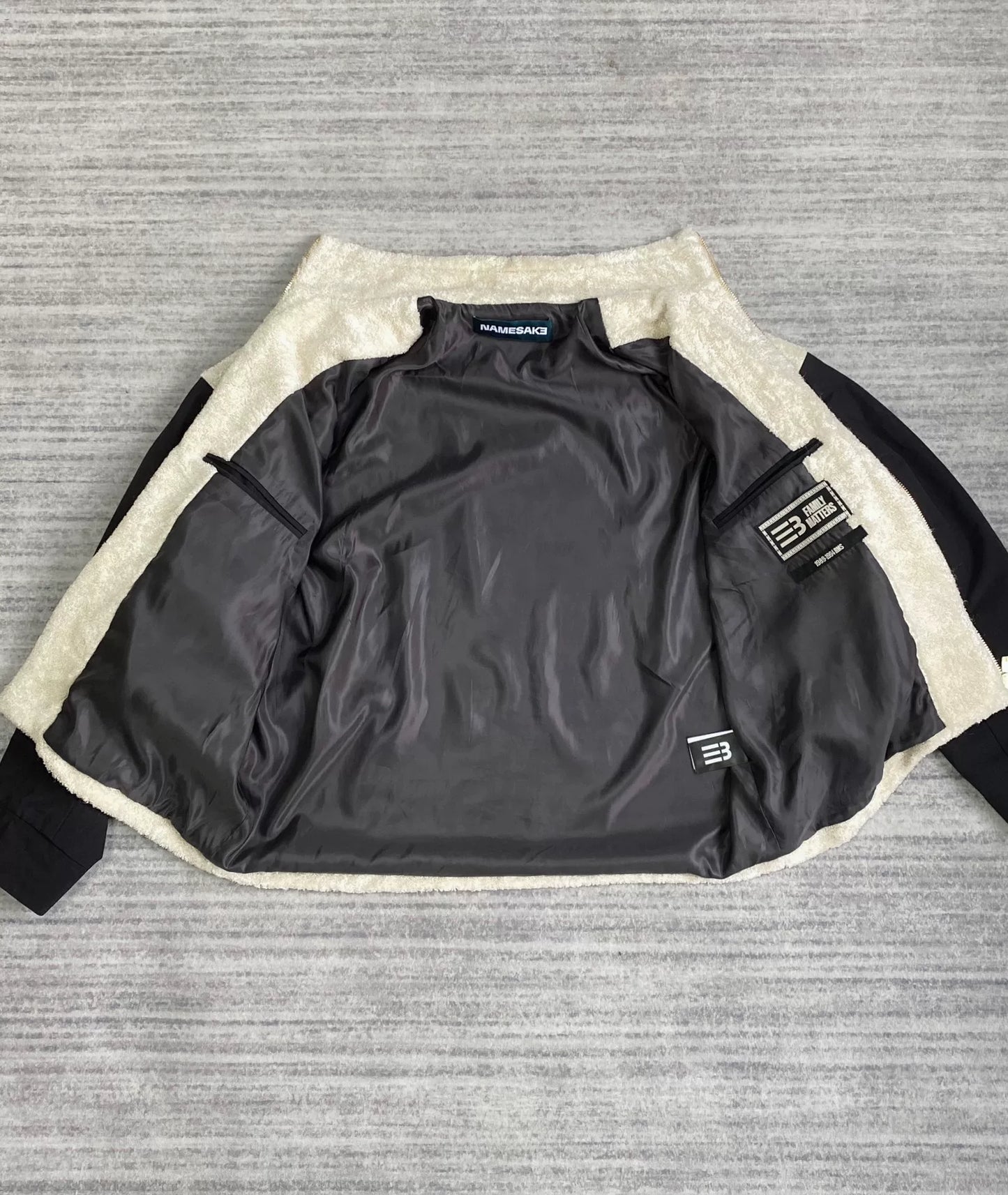 black and white fleece jacket with color blocking