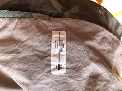 camo jacket with unique distressed details