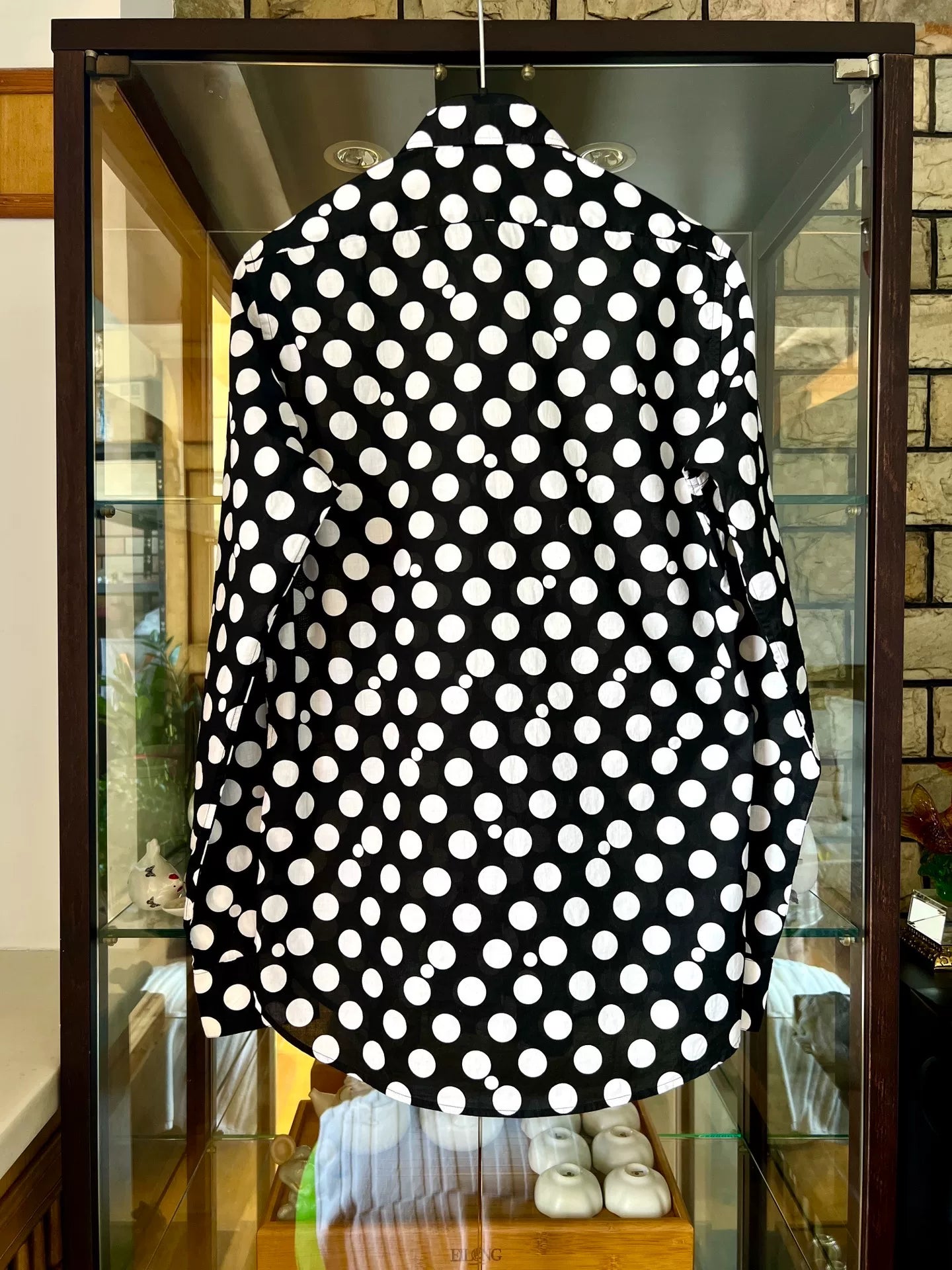 black and white polka dot shirt
