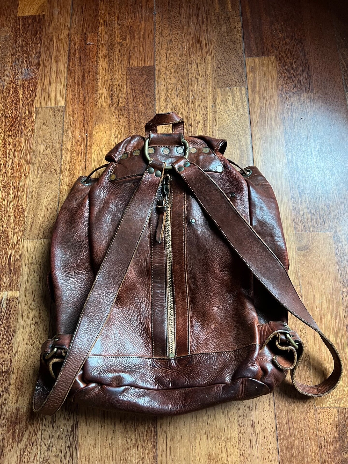 brown leather RRL backpack with pockets