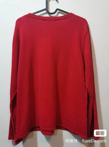 red long sleeve knit sweater with zigzag design